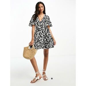 Influence frill wrap mini dress in monochrome abstract print